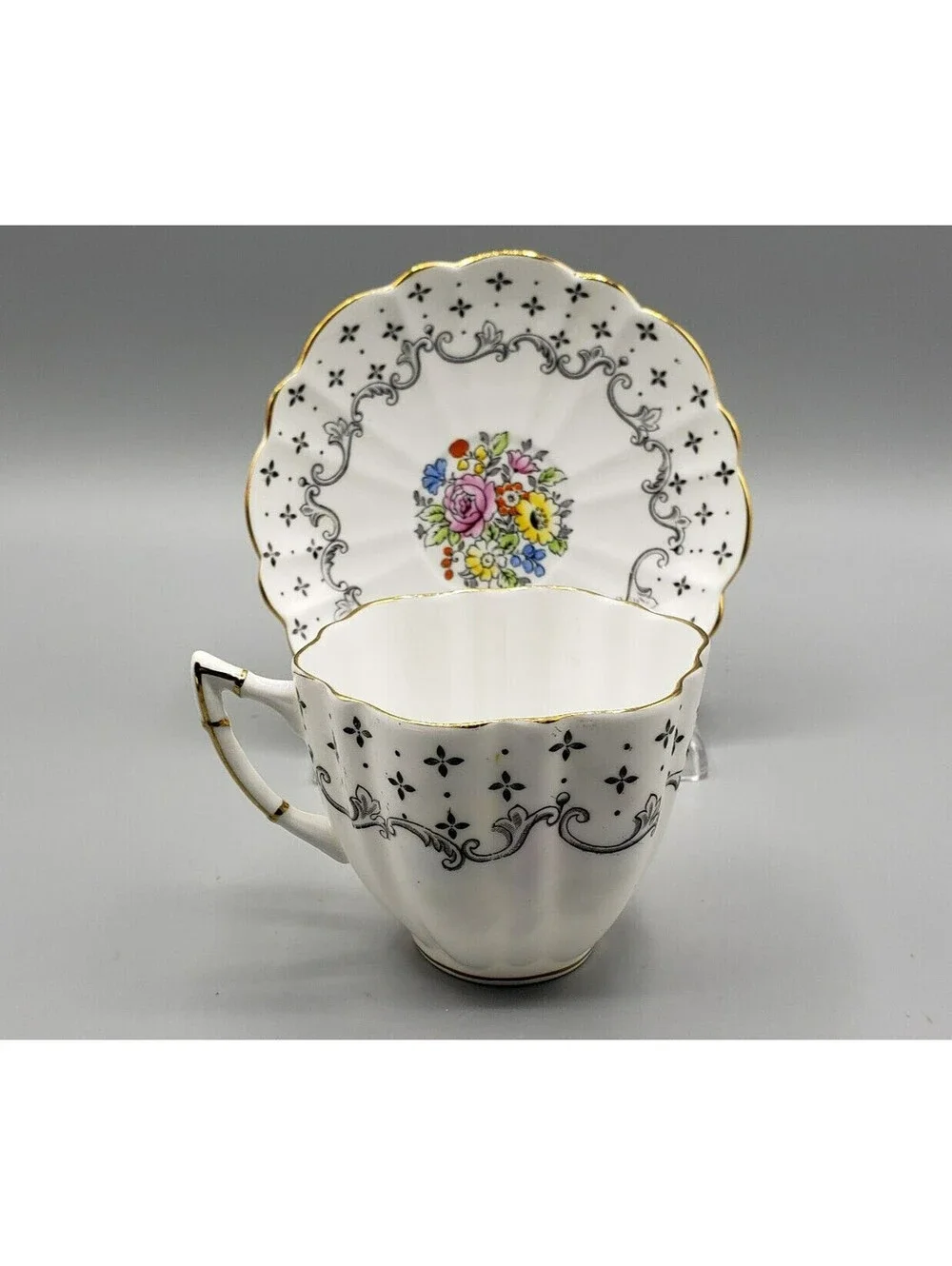 VTG Victoria C&E Teacup & Saucer Black Pattern Flower Medallion England Dainty